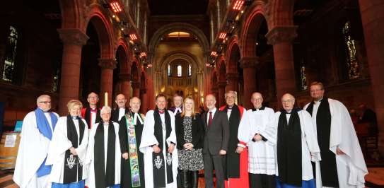 Church representatives gather in St Anne's Cathedral, County Cork for Christian Aid's 70th anniversary celebration