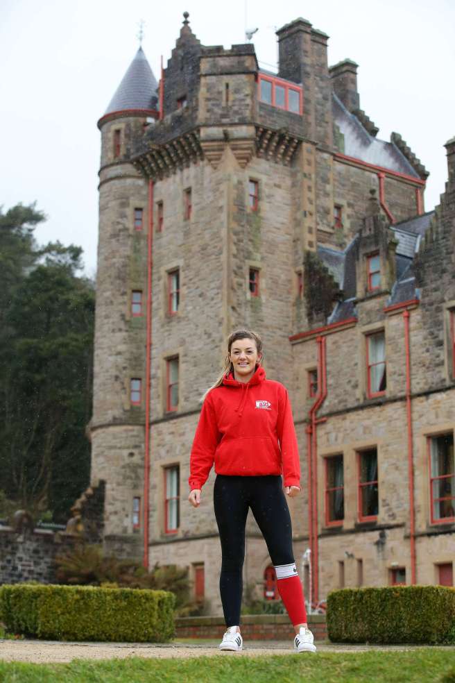 MMA world champion Leah McCourt prepares to abseil Belfast Castle for Christian Aid