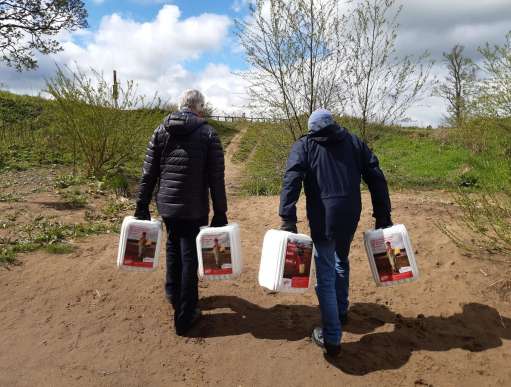 Hexham supporters carrying water