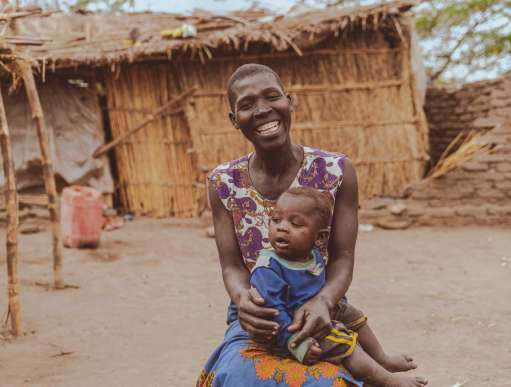 Selena Feleeski with her child, smiling