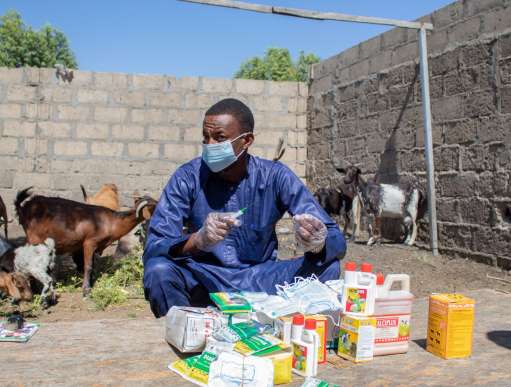 Man holding medical supplies