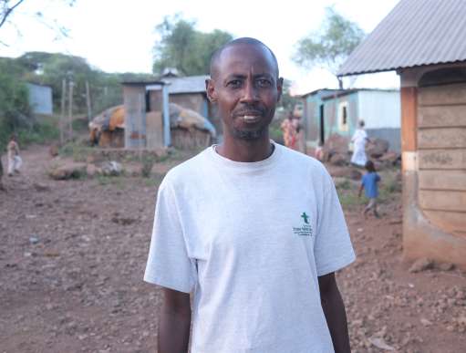 man standing in field