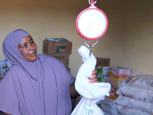 Woman with weighing scales