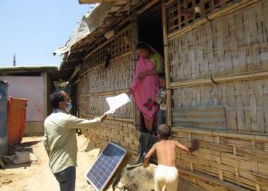 Handing out information on Coronavirus in Bangladesh