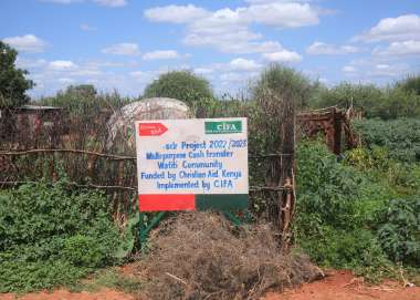 Sign on fence